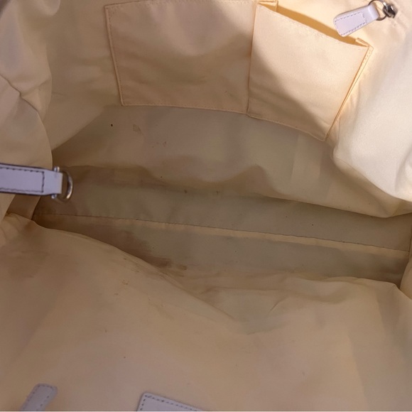 Larger Coach tote- has blemishes pictured on handles. Make up stain on the insid - Picture 3 of 5